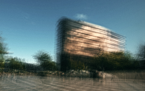 A painterly, multi-layered architectural photograph of an office building. The repetitive lines and glass reflections are blended to create a soft, abstract texture that feels structured and balanced.
